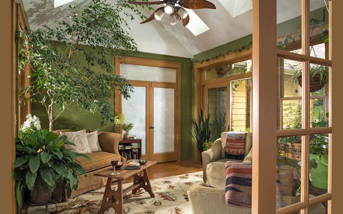 Curl up with a good book in the sunroom.