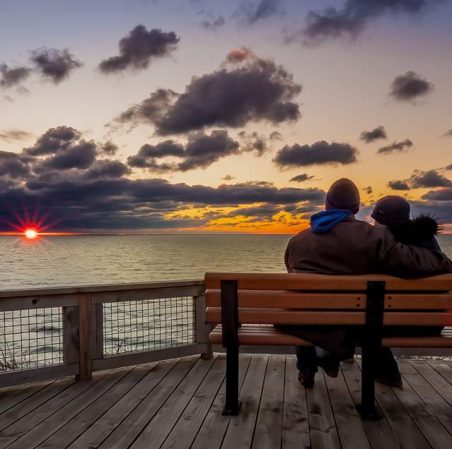 Couple sharing a quiet moment overlooking Lake Michigan