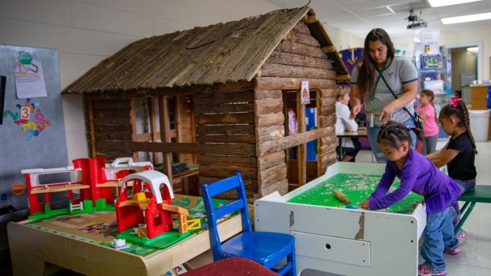 Children exploring hands-on exhibits at Lander Children's Museum