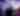 Father holding daughter up to holiday lights on ceiling at Columbus Zoo's Wildlights