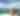 A person takes a photo of the Toronto skyline from a boat on Lake Ontario