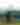 A person looks at the Toronto skyline from Riverdale Park in Toronto's east end