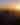 4 hikers stand at an overlook above Tucson looking into the sunset