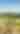 Woman hikes across a ridgeline in the Keweenaw