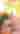 A little girl browsing through pumpkins in a pumpkin patch