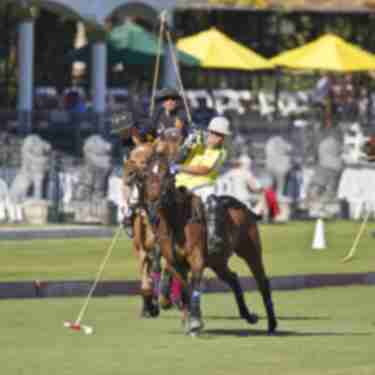 Two people playing polo at Empire Polo in Indio, CA
