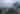a stage with a cloudy sky above
