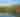 Trees on a lake with a kayaker