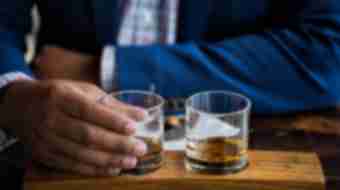 Two glasses of bourbon.