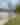 Woman walking at the shore of Caribbean Mamey Island
