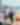 Couple holding kayak oars standing on the beach in Avila Beach