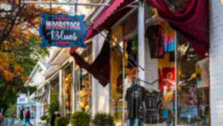 Sign for a shop called "Woodstock Blues" on Woodstock's Tinker Street