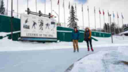 Two skaters on Olympic Skating Oval