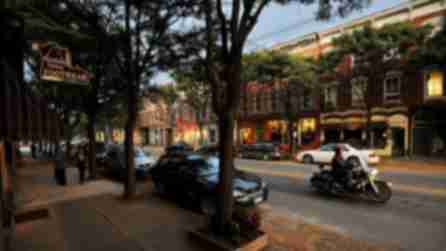 View of cute local shops on Rhinebeck's main street at dusk