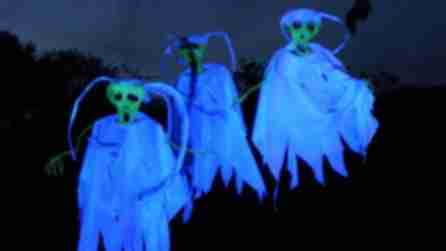 Three ghost-like figures