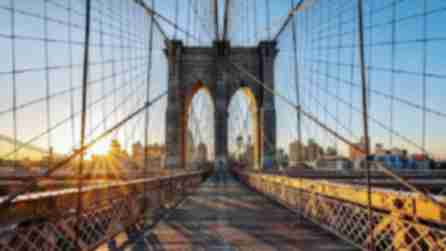 View of the walkway on the Brooklyn bridge as the at sunrise