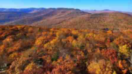 Mountains decorated in the oranges of fall