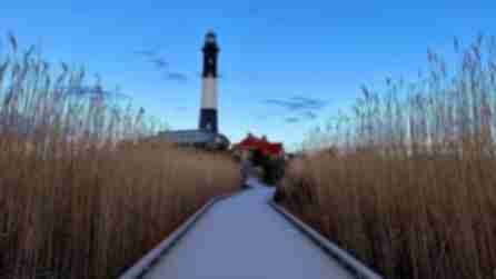 Greay boardwalk leading up to the Fire Island Lighthouse