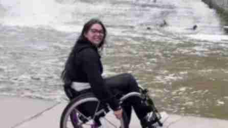 Tara Shetterly, who uses a wheelchair, poses in front of Buttermilk Falls