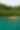 Woman kayaking surrounded by mangroves in calm waters in Portobelo, Panama
