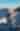 Women wearing sun hat on boat in the middle of a lake pointing at the hill