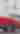 A classic red Elantra in downtown Flint during the Back to the Bricks cruise.