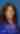 woman with blue blouse in front of blue blackground