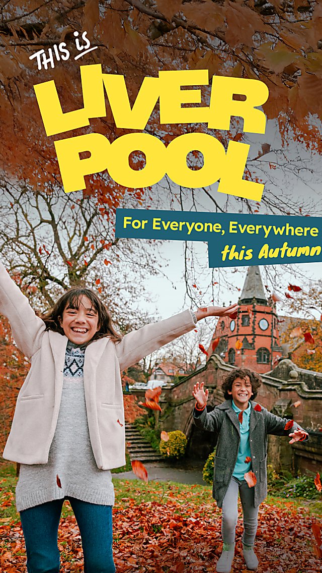 Two children playing in orange leaves with a brick building behind them. The text says This is Liverpool in yellow.