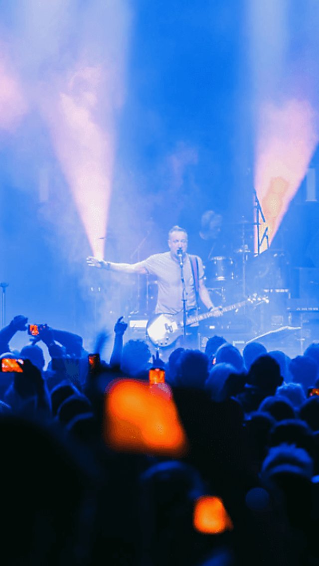 A gig with lots of lasers and a band on stage