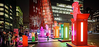 Large boxes that light up with characters popping out of the top of them.