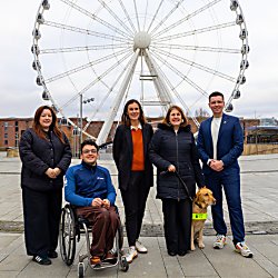 Five people in a row infront of a large ferris wheel in Liverpool. Left to right:
 
- Kate Wallace, UK Sport
- Harri Jenkins, Paralympian
- Jennifer Cleary, Director, Combined Arts and North 
- Mandy Redvers-Rowe, DaDa board member
- Cllr Harry Doyle, Liverpool City,  Council, Cabinet Member for Health, Wellbeing and Culture 

Location: ACC Liverpool