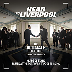 An image of John Cena and Idris Elba shaking hands with people standing either side of them.