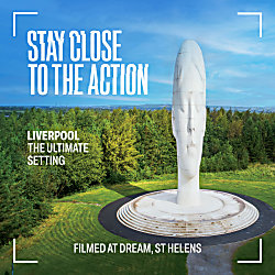 An image of Dream, a head artwork in white with bushes and trees behind it. There is text on the image which says 'Stay Close to the action'.