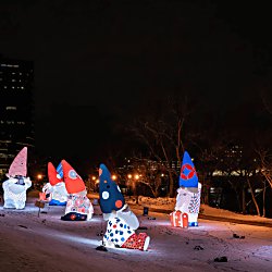 Several artworks of Gnomes with illumination at night.