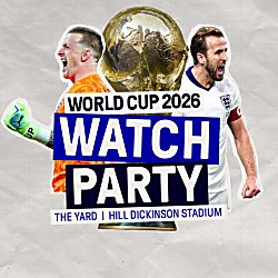 Promotional graphic for a “World Cup 2026 Watch Party.” A large gold World Cup trophy is centered behind two football players in national team kits, one in orange on the left and one in white on the right. Bold blue and white text reads “WORLD CUP 2026 WATCH PARTY,” with smaller text below stating “THE YARD | HILL DICKINSON STADIUM.” The design is set against a light textured background with a subtle grid pattern.