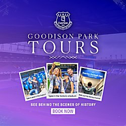 Purple Everton-themed promotional graphic for Goodison Park stadium tours. The Everton crest appears at the top above the large text “GOODISON PARK TOURS.” A faded background image shows the stadium stands. Three small photos in the centre show visitors: one sitting in the dugout, another taking a selfie inside the stadium, and another walking through the players’ tunnel. Beneath the images, text reads “SEE BEHIND THE SCENES OF HISTORY” with a “BOOK NOW” button below.