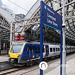 An image of Northern Train with a blue sign saying ''Liverpool Lime Street''.