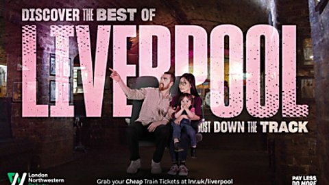Two people sitting with a child on their lap and pink text behind that says ''Discover the best of Liverpool''.
