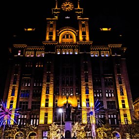 Large dandelion shapes in front of the Liver building that look like fireworks
