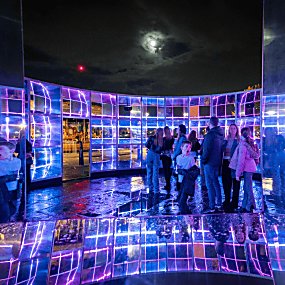 A light installation with mirrors and blue lights