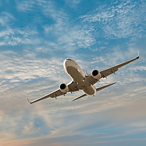 A passenger plane flying through the air