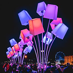 Lampshades lit up colours such as red, blue and purple.
