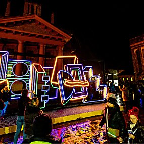 A geometric shape of boxes and neon lights outside the historic Martin Luther King Jr building at night
