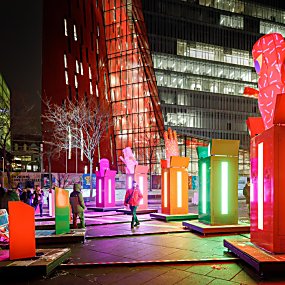Large boxes that light up with characters popping out of the top of them.
