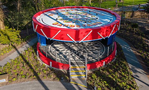 A large band stand in the shape of a drum at Strawberry Field.