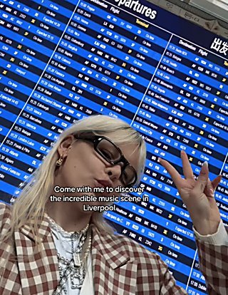 A GIF of a girl travelling to Liverpool via plane