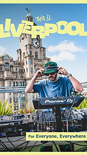 A DJ behind a deck on a rooftop with the Royal Liver Building in the background. It says 'This is Liverpool' in yellow letters. It says 'for everyone, everywhere' in a yellow bow at the bottom.