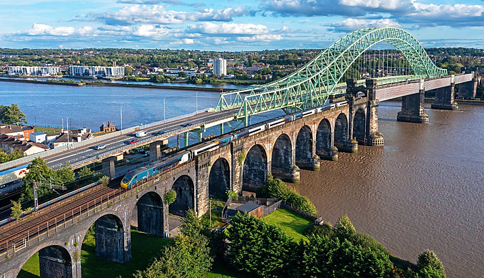 An Avanti West Coast train going under the Runcorn Bridge
