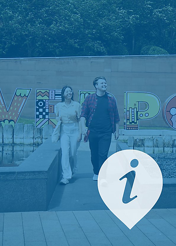 Two people walking towards the camera with a large Liverpool sign behind them. They are smiling brightly and the image has a blue wash over it with an I to the bottom right of the image.