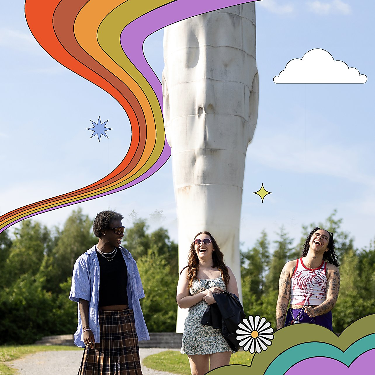 Three people smiling and walking with The Dream in the background.